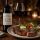 Eine Flasche Groot Constantia mit Rumpsteak und Kräuterbutter bei Kerzenlicht